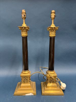 pair of antique brass and black marble candles on stands