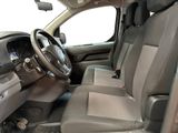 the interior of a car with a steering wheel and a dashboard