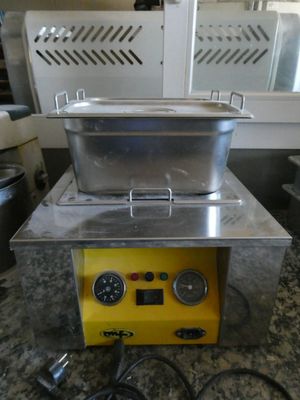 une image représentant une machine posée sur un comptoir
