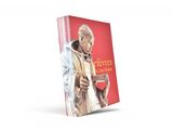 un livre sur lequel figure la photo d'un homme tenant un verre de vin