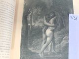 un livre ouvert sur lequel figure l'image d'un homme et d'une femme nus