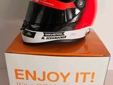 the helmet is sitting on top of the box on the table