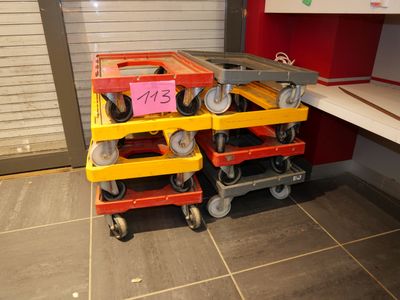 a cart that has a lot of wheels on it