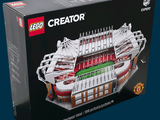 a lego model of a soccer stadium in a box