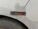 a sticker on the side of a car that says outuaia