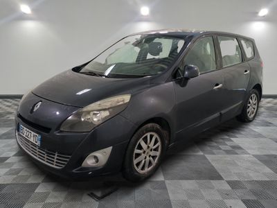 a picture of a black car parked in a garage