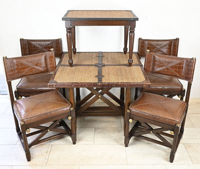 a table with six chairs around it and a table with four chairs around it