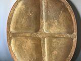 an image of a wooden plate with four sections in the center