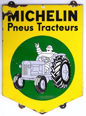 yellow and green sign with a man driving a tractor on it