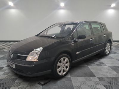 a picture of a black car parked on a checkered floor