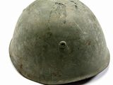 a helmet that has a hole in the middle of it
