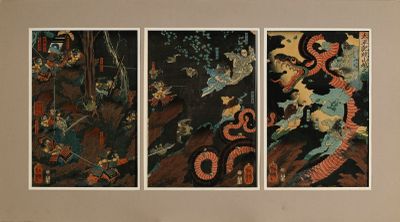 trois tableaux accrochés au mur d'une pièce où se trouve un canapé