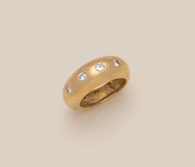 a gold and diamond ring