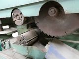 a picture of a machine that is working on a piece of metal