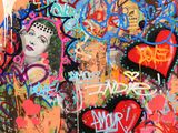 a painting of a woman on a wall covered in graffiti