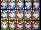 a close up of a bunch of pokemon cards on a table