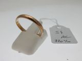 l'image d'une bague en or portant une étiquette de prix
