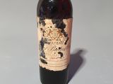 a bottle of wine that is sitting on a table