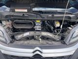 the engine of a car with its hood open and the hood open