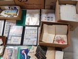 many boxes of books and papers on a table