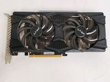 a close up of a video card with a fan on it