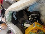 a pile of assorted items in a plastic bag
