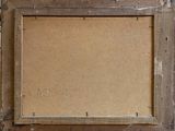 an old picture frame with a piece of burlock on it