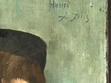 portrait of a young boy in a black hat and blue shirt