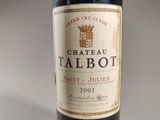 a bottle of wine that is sitting on a table