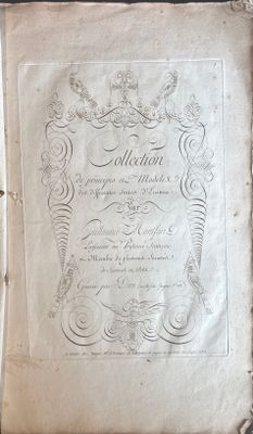 an old book with writing on it sitting on a table