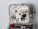 a close up of a small electronic device on a wall