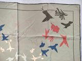 a picture of a handkerchief with birds and flowers on it