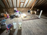 a room that has a lot of stuff on the floor