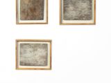three framed photographs of a man sitting on a bench in front of a white wall