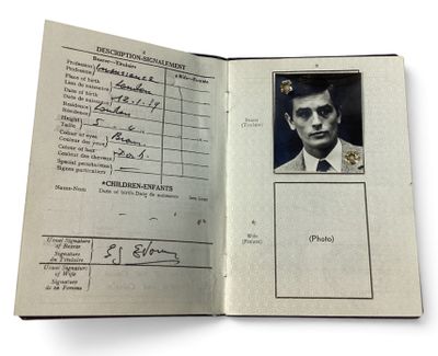 a passport with a picture of a man in a suit and tie