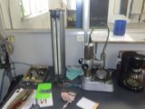 a picture of a cluttered kitchen counter with a lot of clutter on it