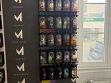 a vending machine in the corner of a room