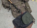 an image of a backpack and a pair of hiking poles