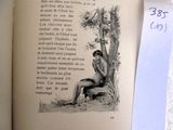 an open book with a drawing of a man sitting under a tree