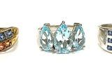 many different rings that are arranged in a row