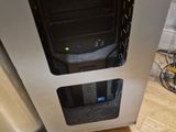 an image of a silver refrigerator with a black door