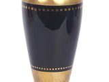 a gold and black vase on a stand with a white background