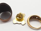 two rings that are sitting next to each other on a table