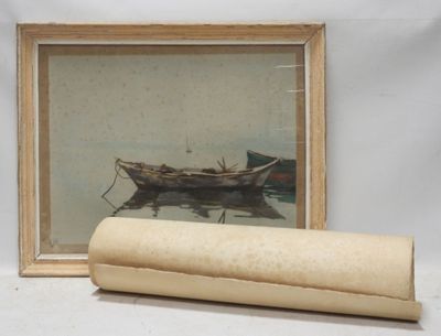 a picture of a boat and a roll of paper on a table
