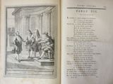 an old book with a picture of a group of people