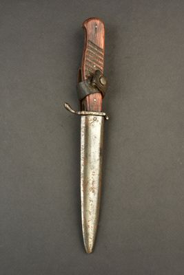 a knife that is laying on top of a table