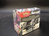 a box of pokemon trading cards on a black surface