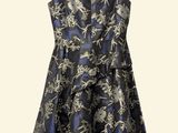 a black and blue dress with a floral pattern on it