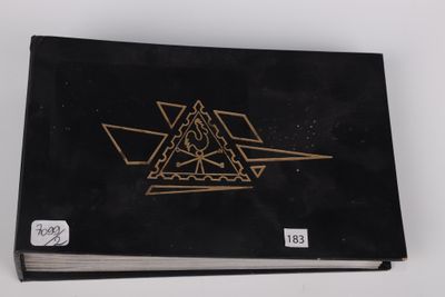 an image of a black book with a gold design on it