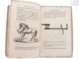 un livre ouvert sur lequel est dessiné un cheval